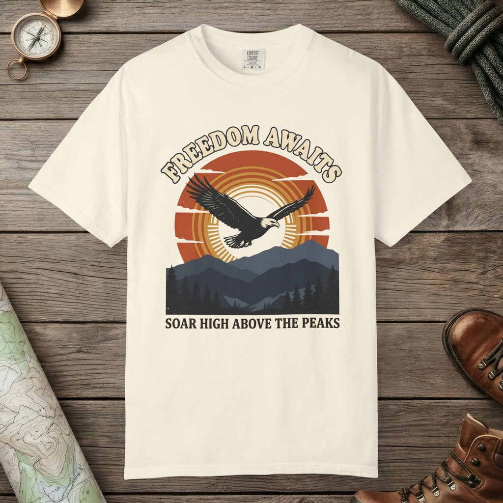 Ivory color unisex graphic t-shirt with "Freedom Awaits" design