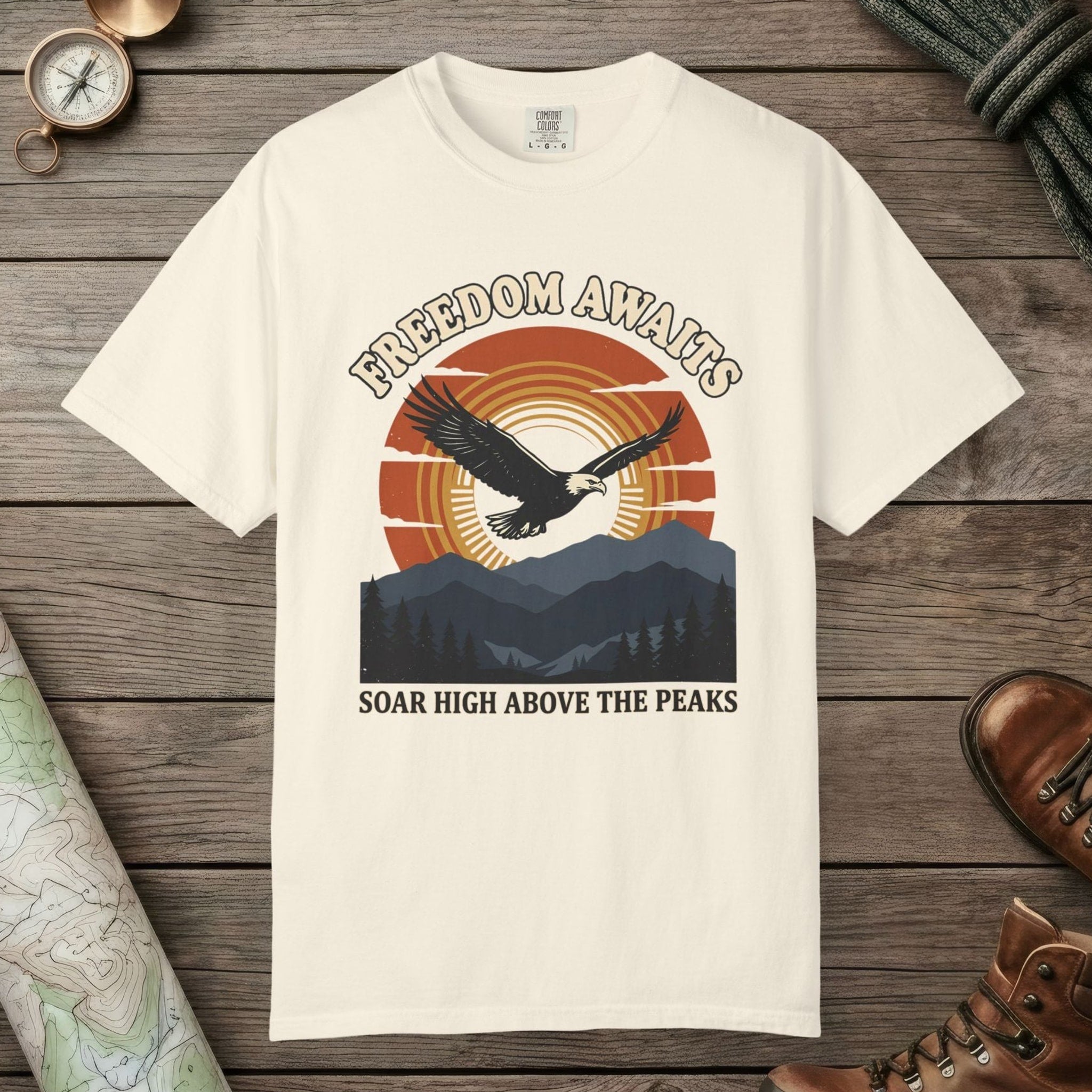 Ivory color unisex graphic t-shirt with "Freedom Awaits" design