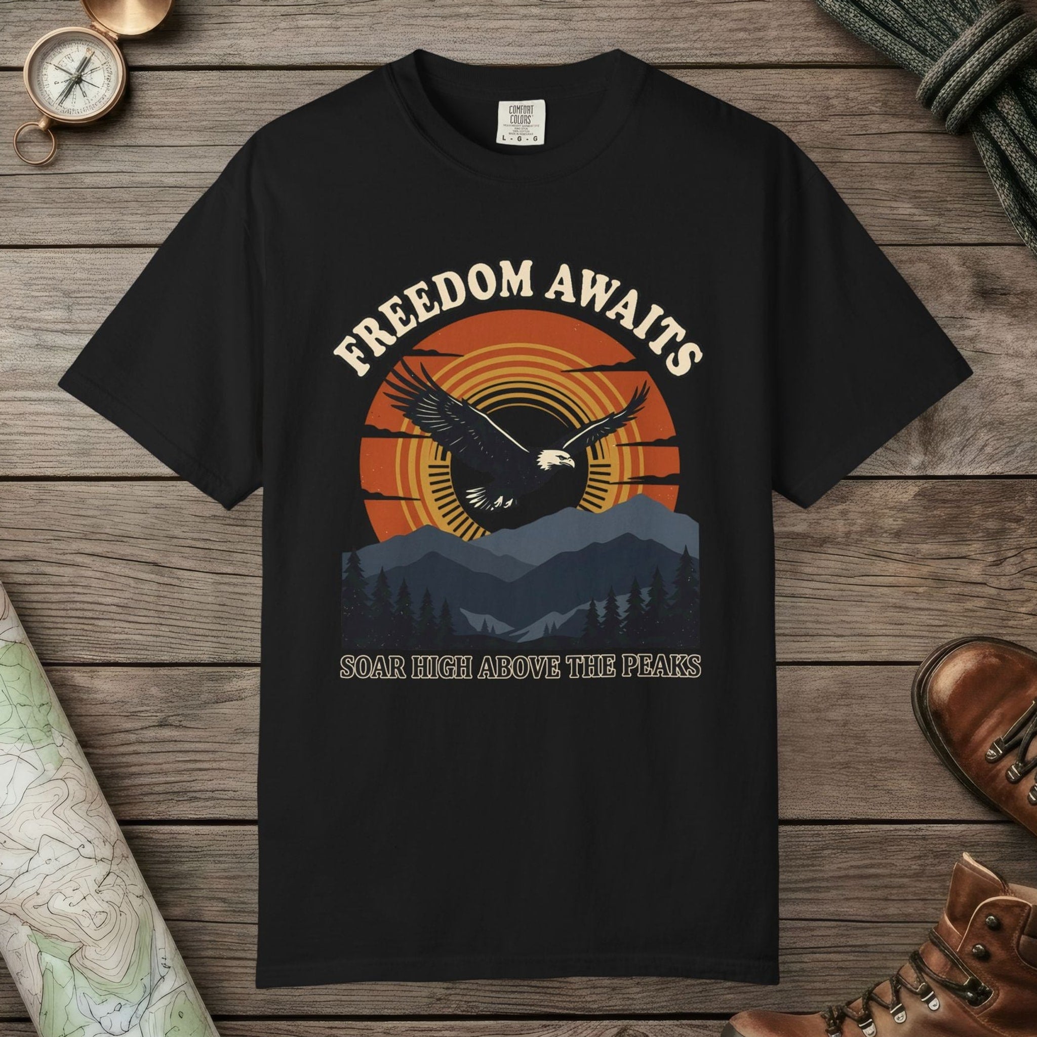 Black color unisex graphic t-shirt with "Freedom Awaits" design