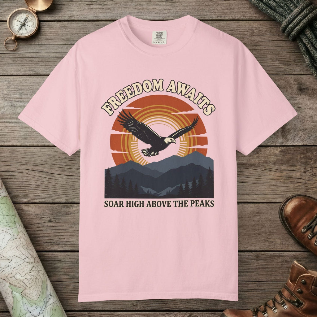 Blossom color unisex graphic t-shirt with "Freedom Awaits" design