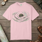 Blossom color unisex graphic t-shirt with "Frog Swimming" design