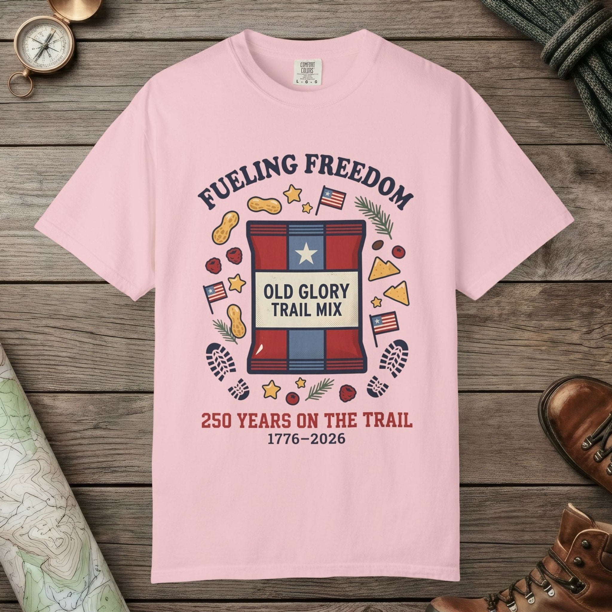 Blossom color unisex graphic t-shirt with "Fueling Freedom" design