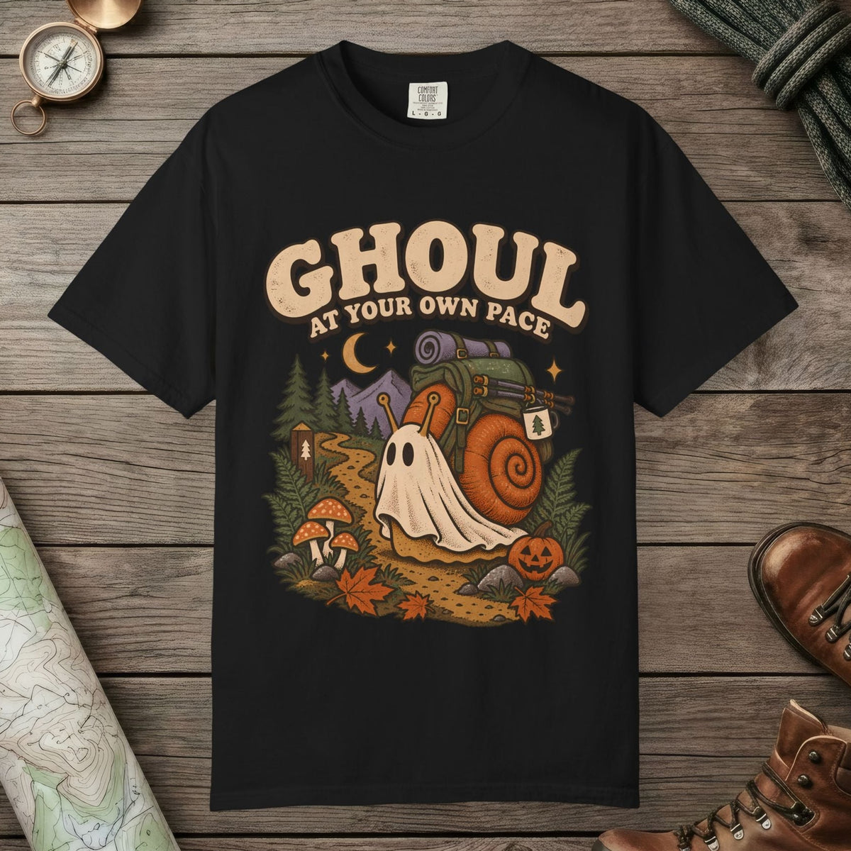 Black color unisex graphic t-shirt with "Ghoul At Own Pace" design