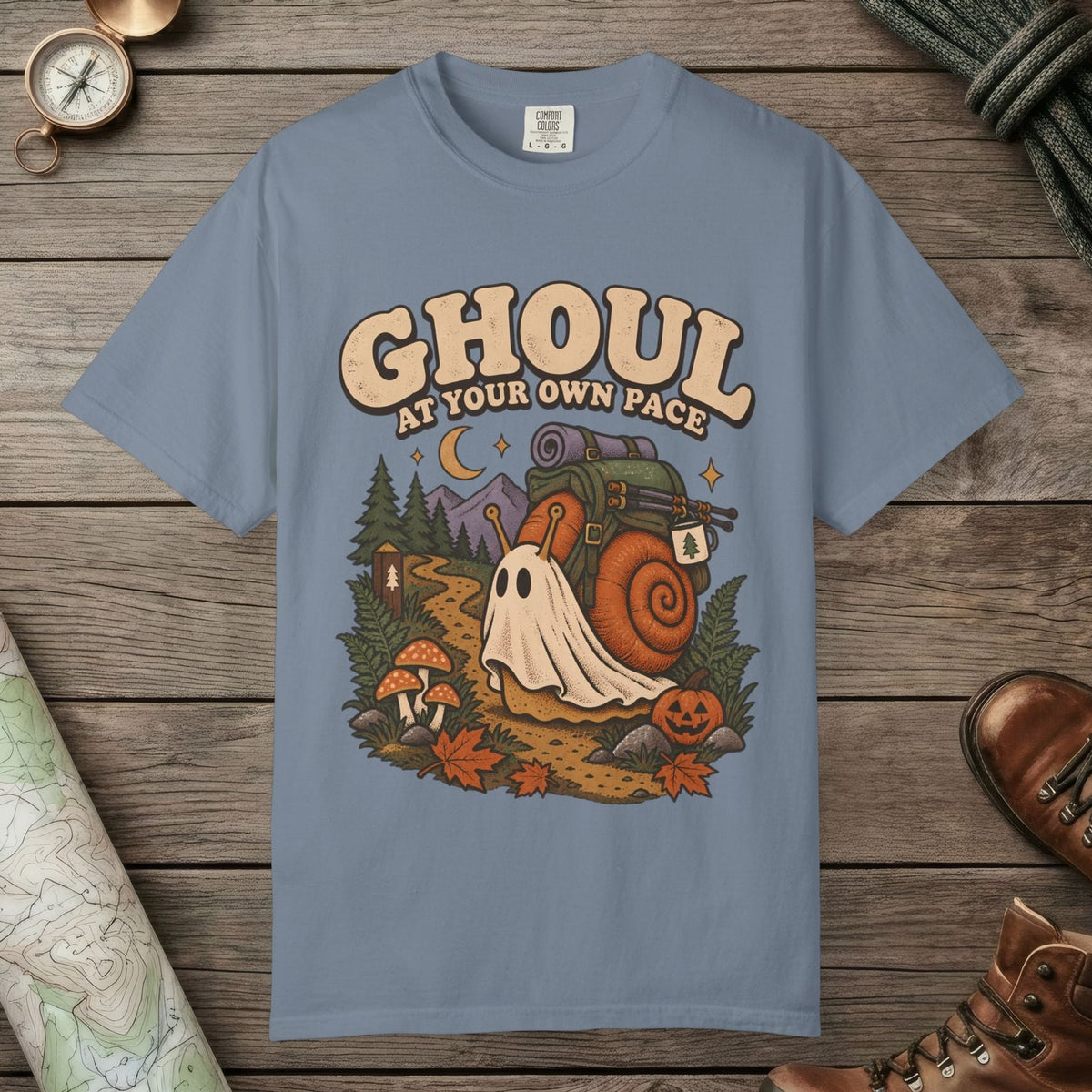 Blue Jean color unisex graphic t-shirt with "Ghoul At Own Pace" design