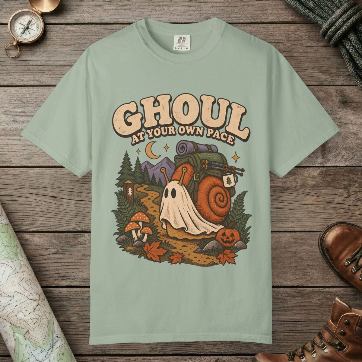 Bay color unisex graphic t-shirt with "Ghoul At Own Pace" design