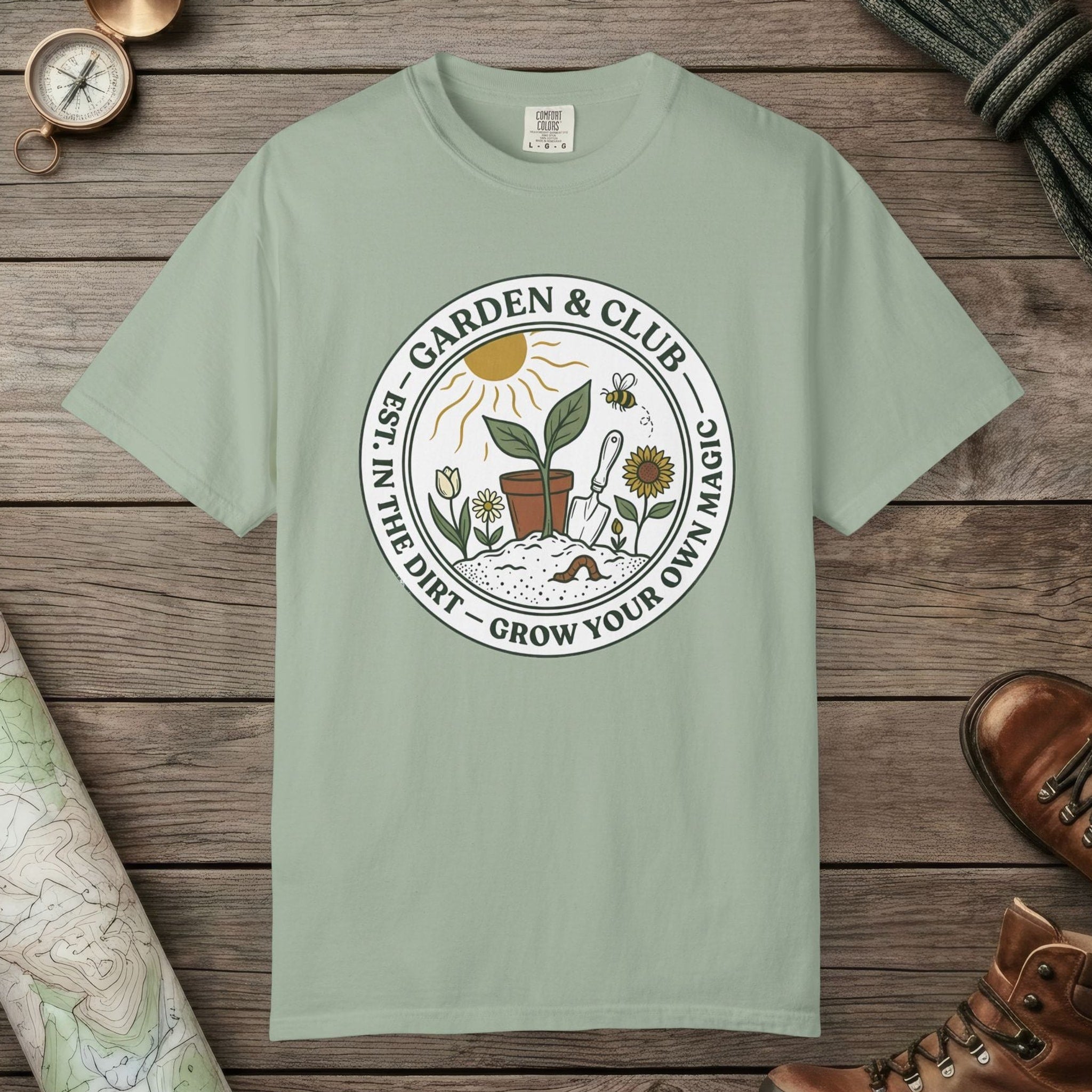 Bay color unisex graphic t-shirt with "Grow Your Own Magic Garden" design