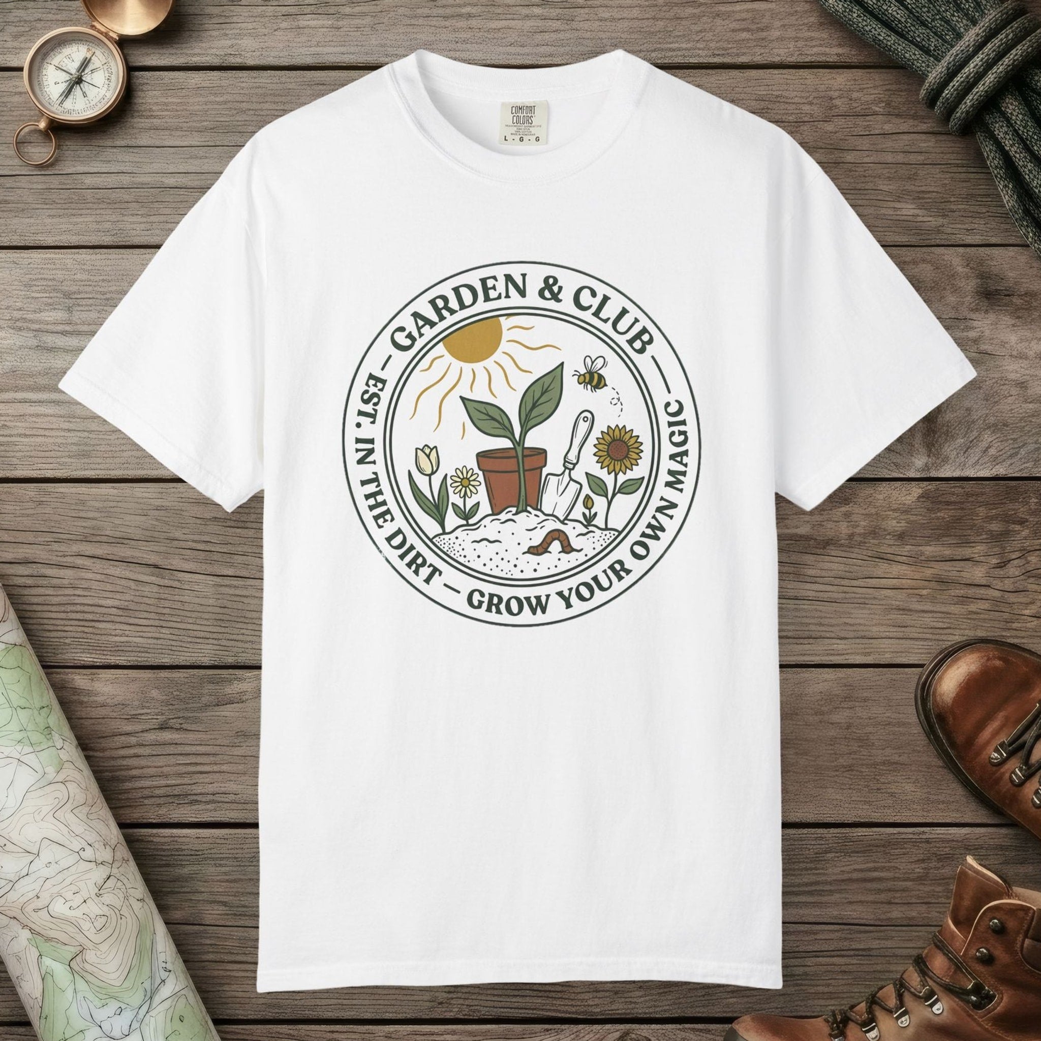 White color unisex graphic t-shirt with "Grow Your Own Magic Garden" design