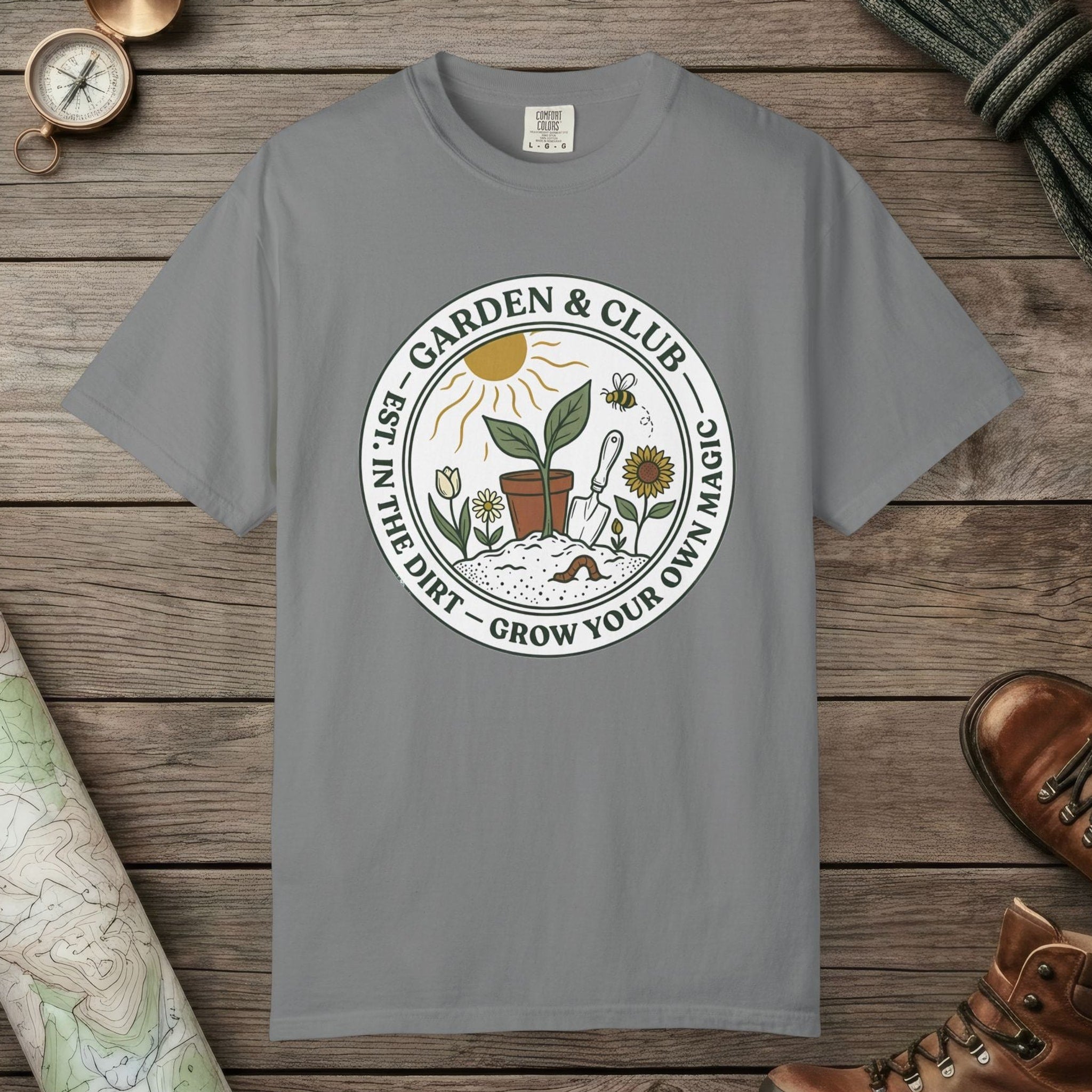 Grey color unisex graphic t-shirt with "Grow Your Own Magic Garden" design