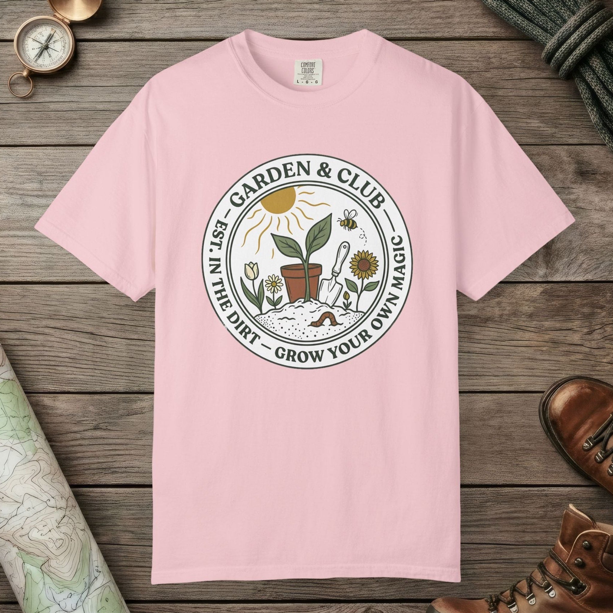 Blossom color unisex graphic t-shirt with "Grow Your Own Magic Garden" design
