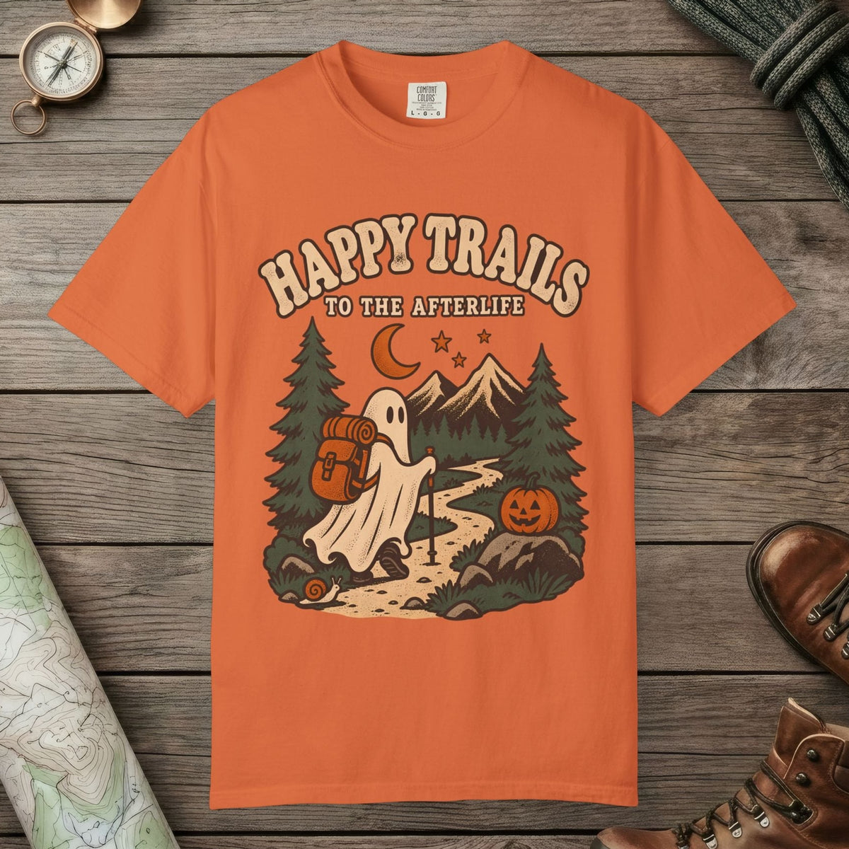 Burnt Orange color unisex graphic t-shirt with "Happy Trails Afterlife" design