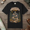 Black color unisex graphic t-shirt with "Haunted Switchback Society" design