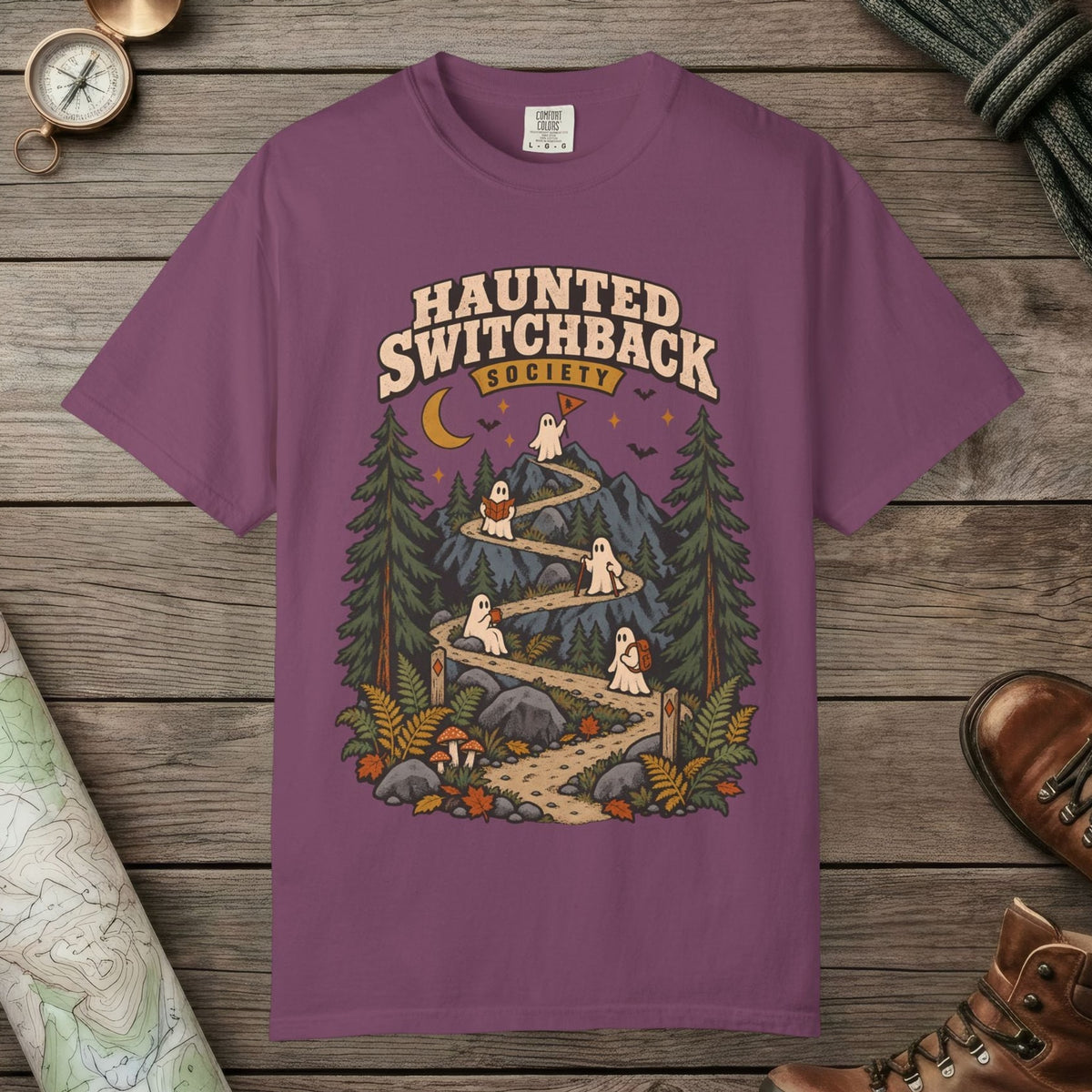 Berry color unisex graphic t-shirt with "Haunted Switchback Society" design