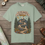 Bay color unisex graphic t-shirt with "Haunted Switchback Society" design