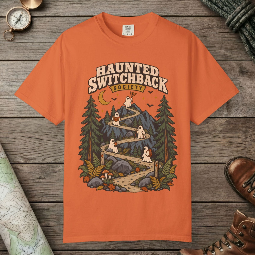 Burnt Orange color unisex graphic t-shirt with "Haunted Switchback Society" design