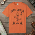 Burnt Orange color unisex graphic t-shirt with "Haunted Trail" design