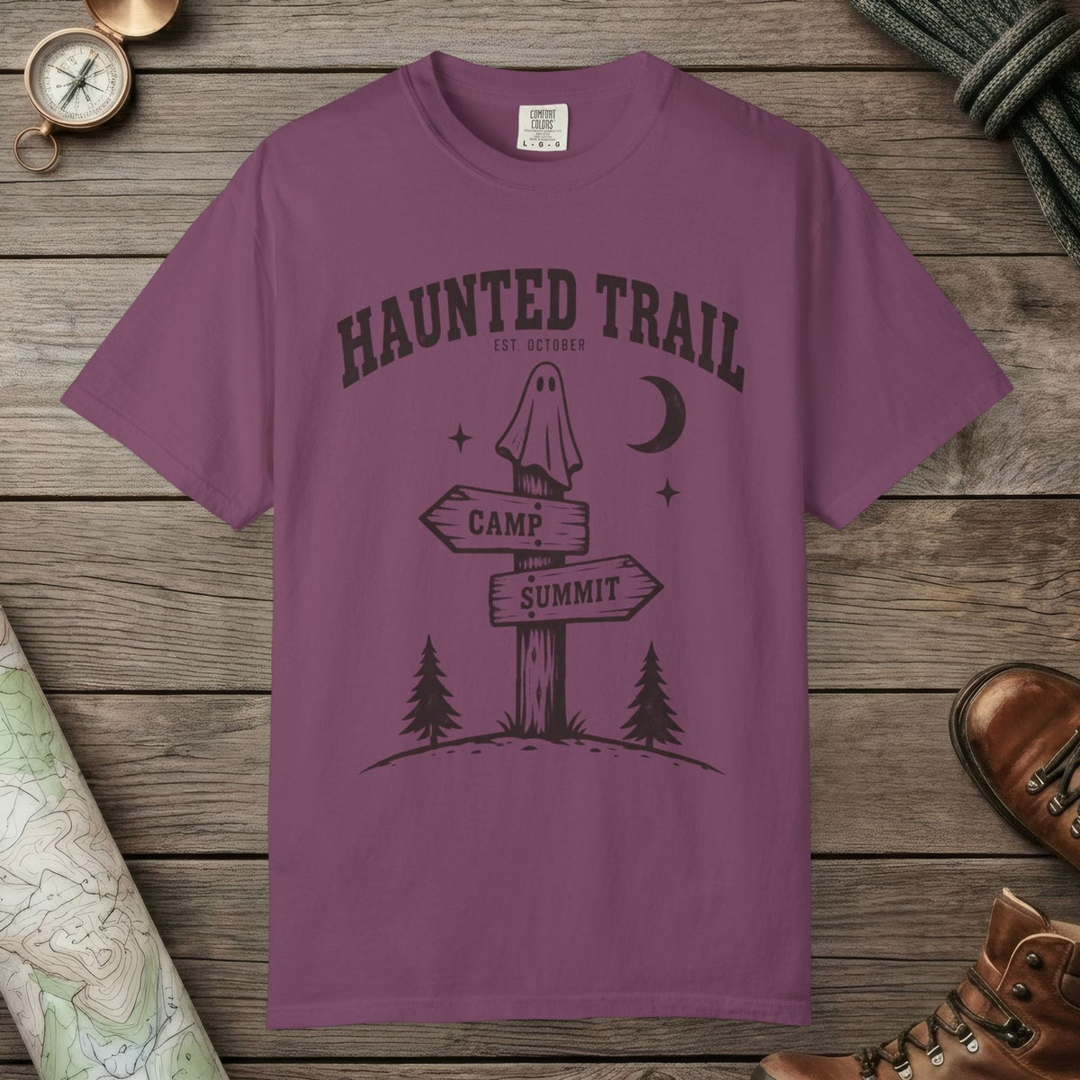 Berry color unisex graphic t-shirt with "Haunted Trail" design