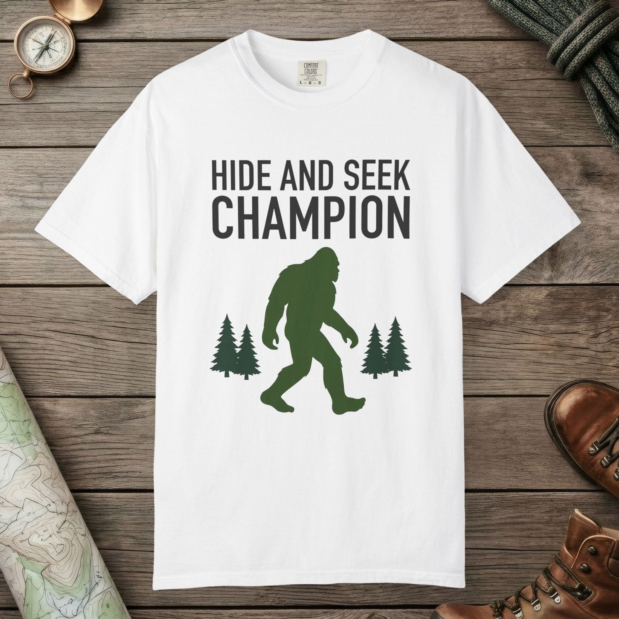 White color unisex graphic t-shirt with "Hide And Seek Champion" design