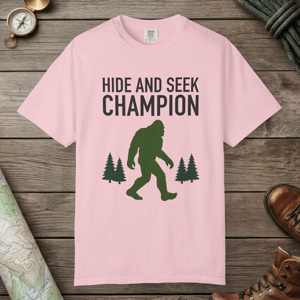 Blossom color unisex graphic t-shirt with "Hide And Seek Champion" design