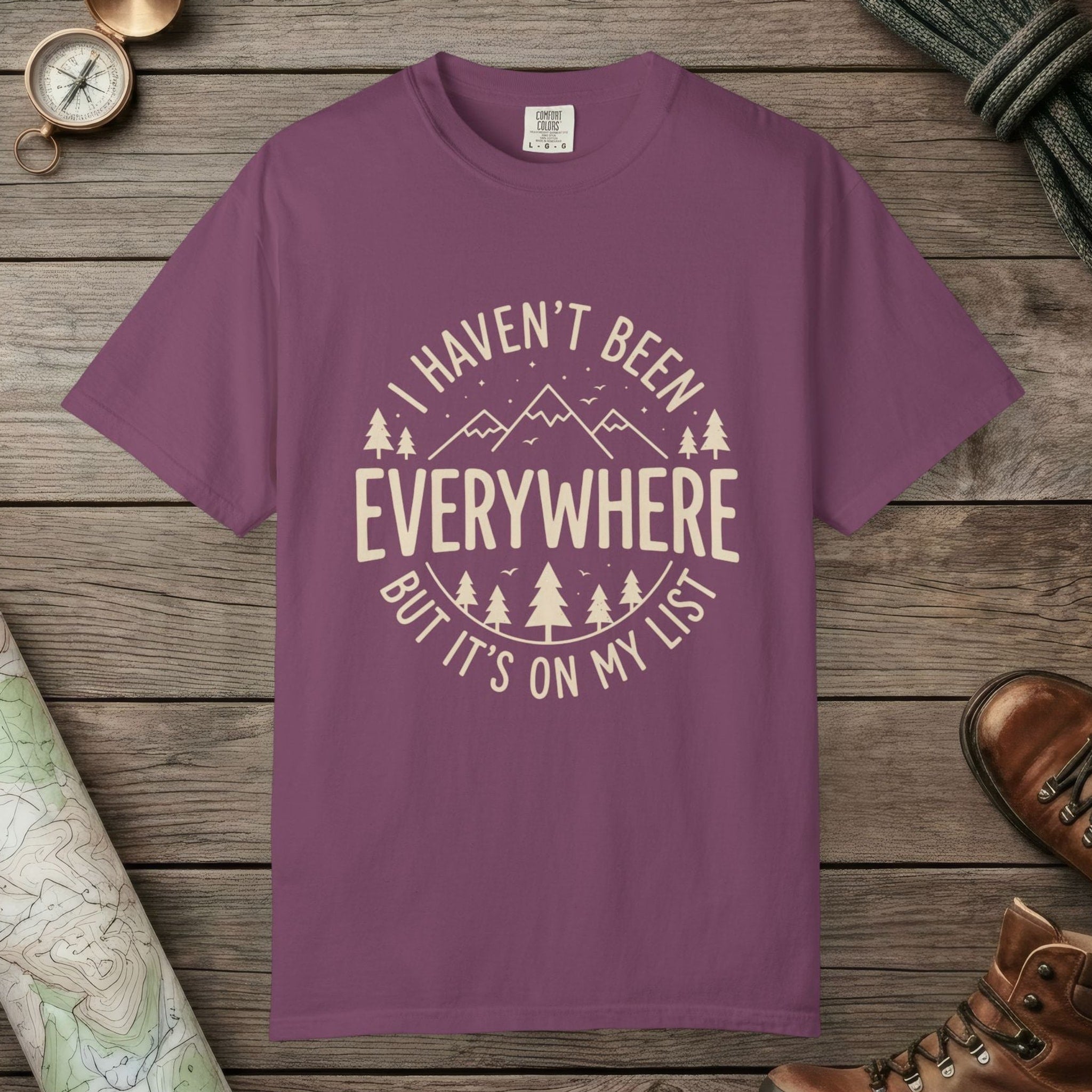 Berry color unisex graphic t-shirt with "I Haven't Been to Everywhere" design