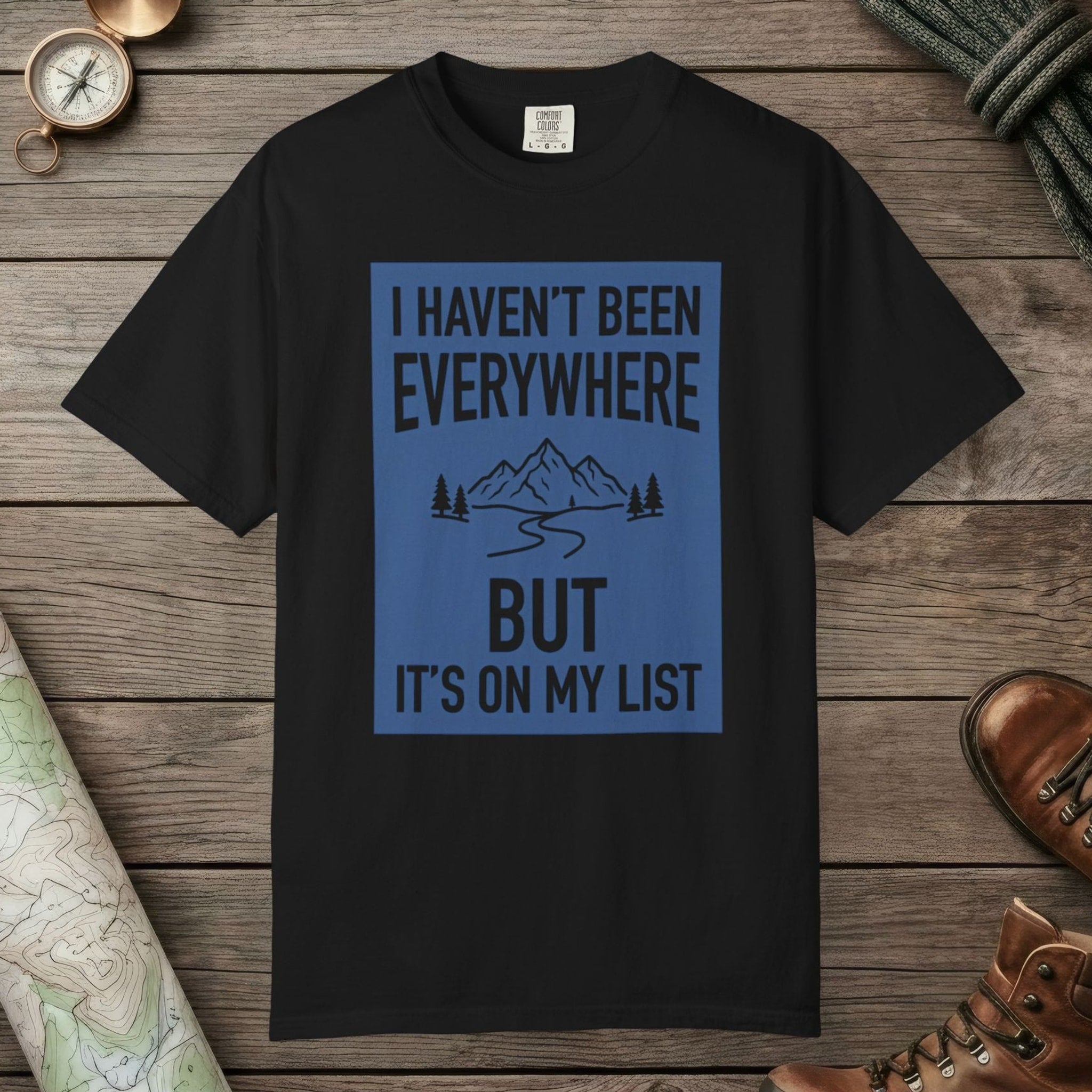 Black color unisex graphic t-shirt with "I Haven't Been to Everywhere" design