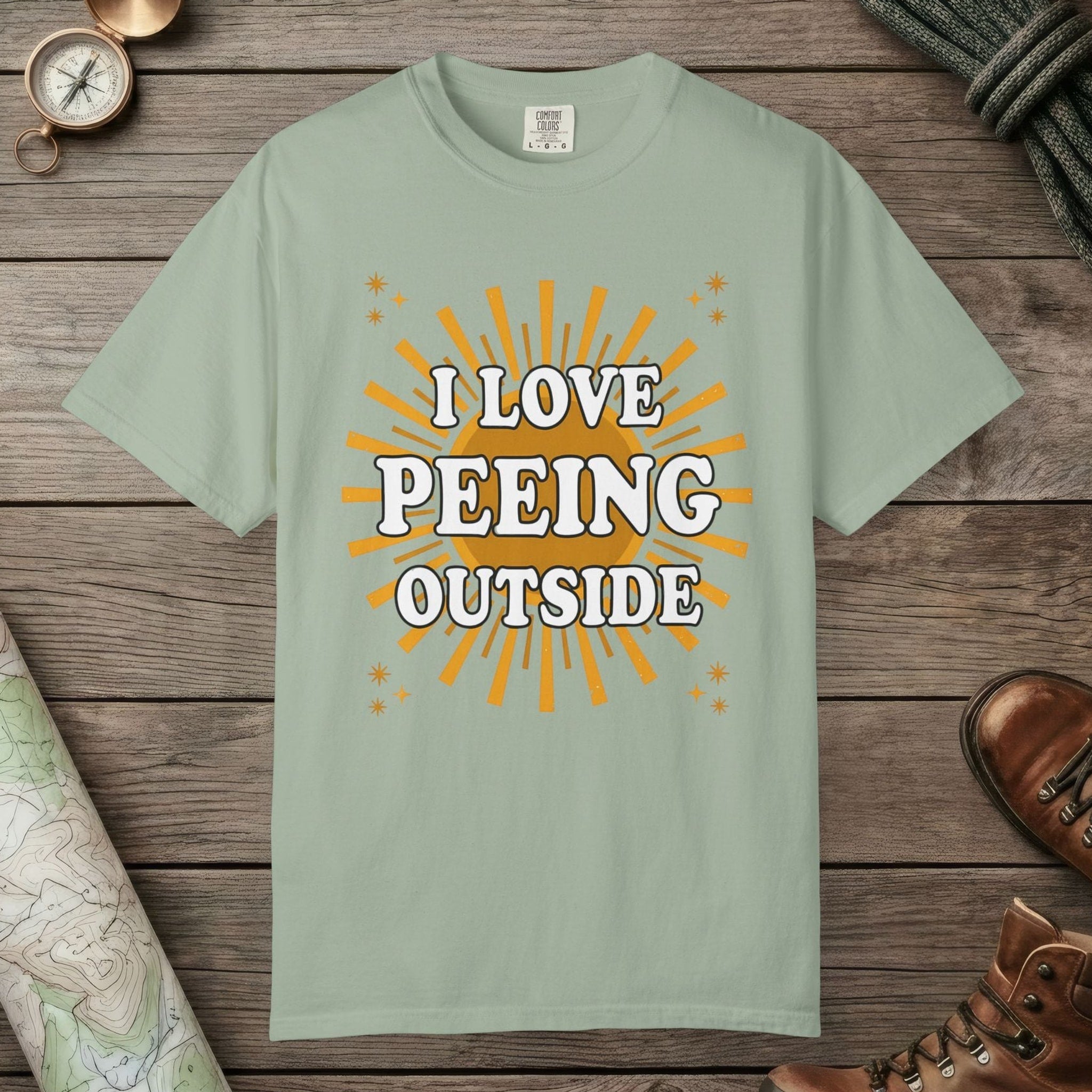 Bay color unisex graphic t-shirt with "I Love Peeing Outside" design