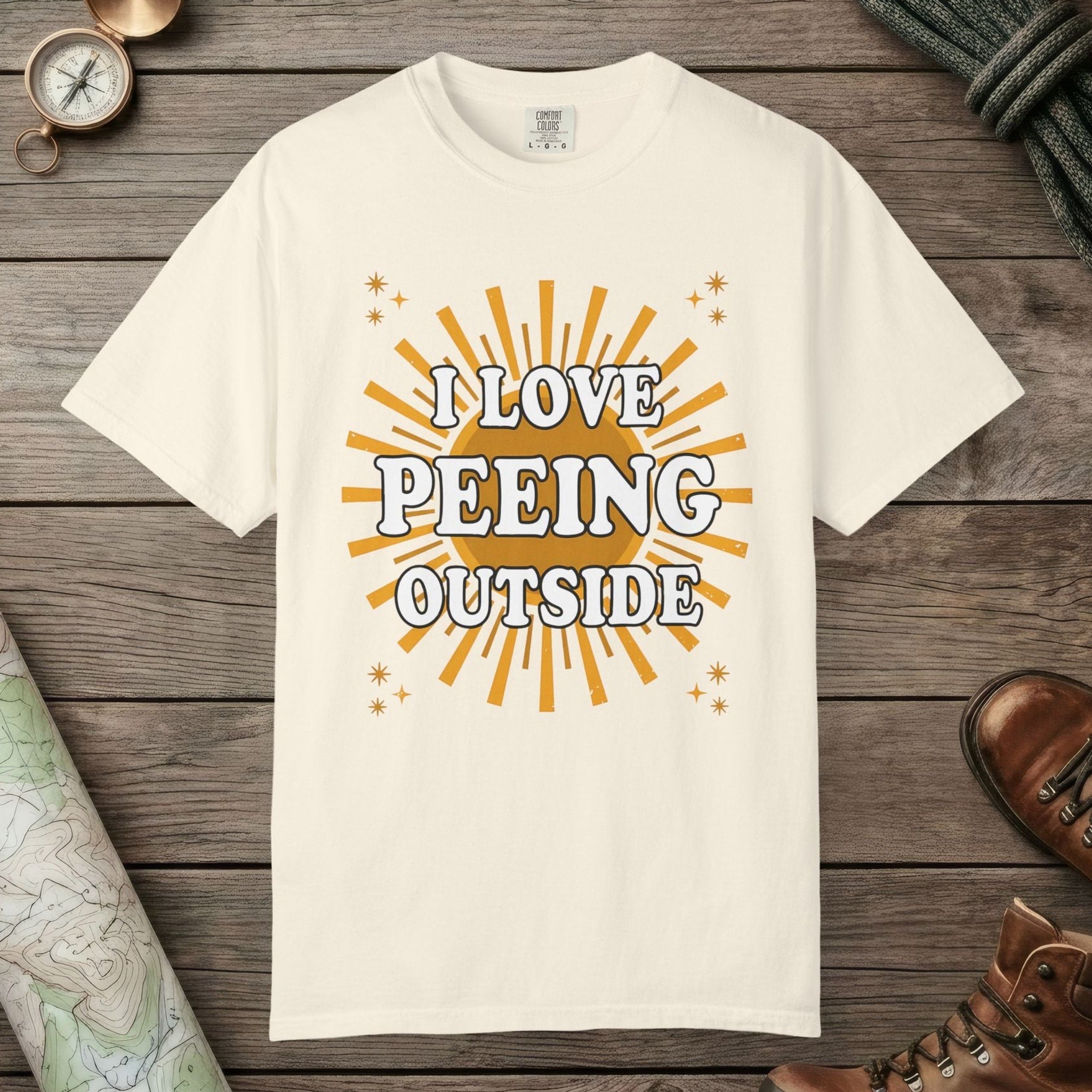 Ivory color unisex graphic t-shirt with "I Love Peeing Outside" design