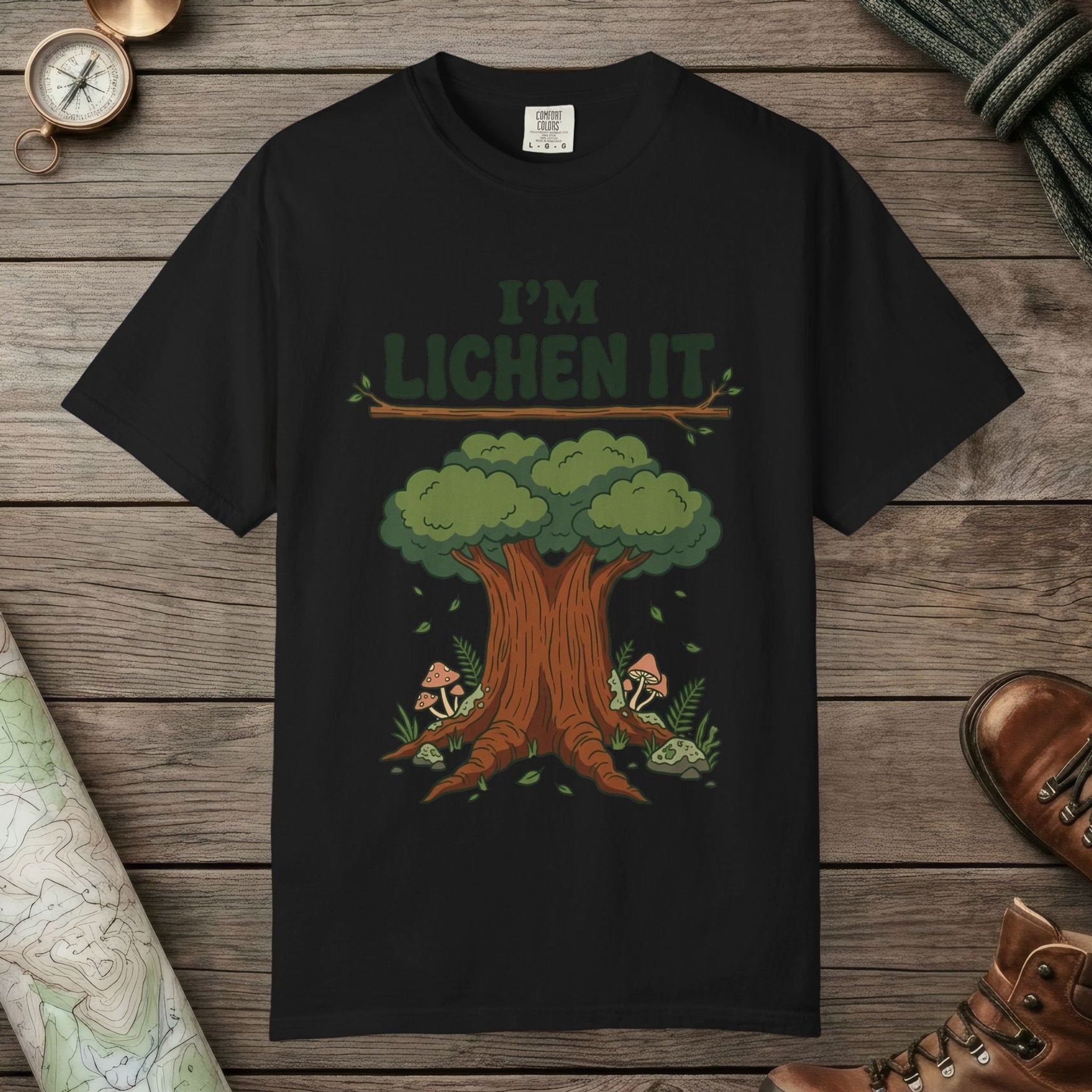 Black color unisex graphic t-shirt with "I'm Lichen It" design