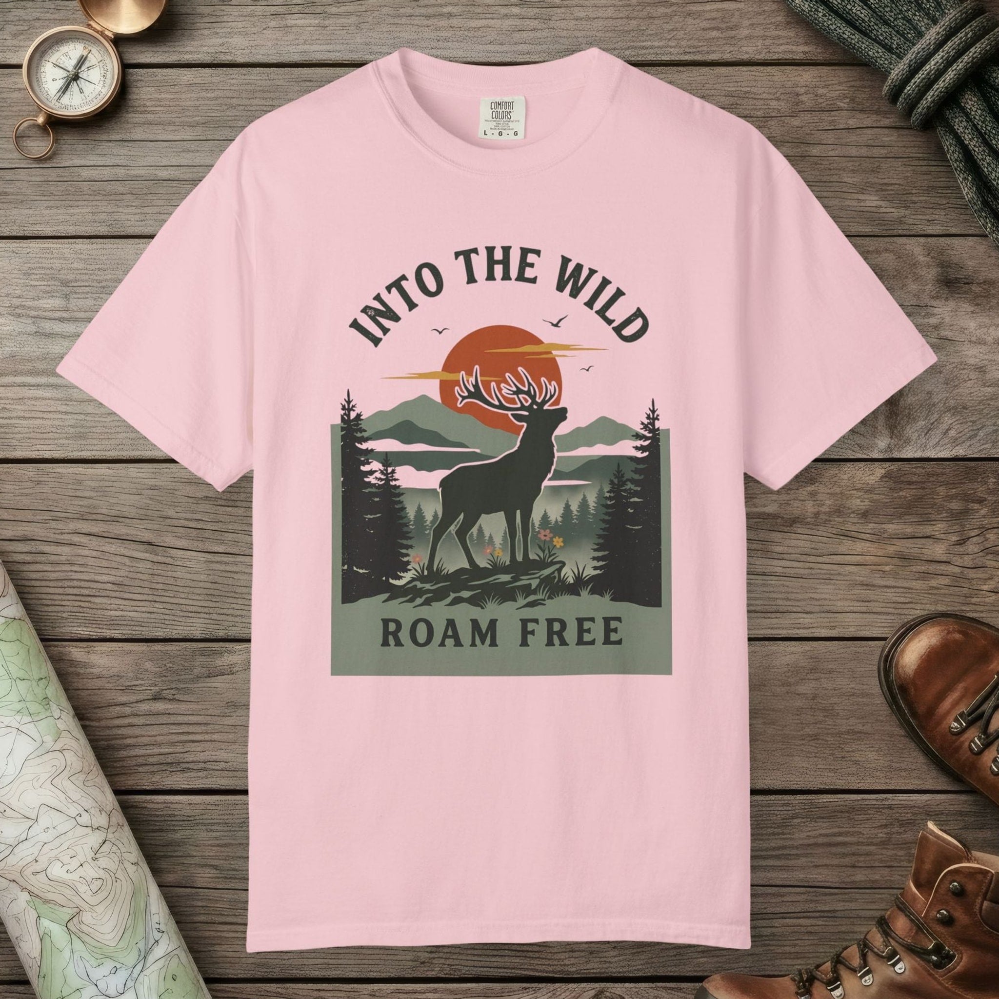 Blossom color unisex graphic t-shirt with "Into The Wild Vintage" design