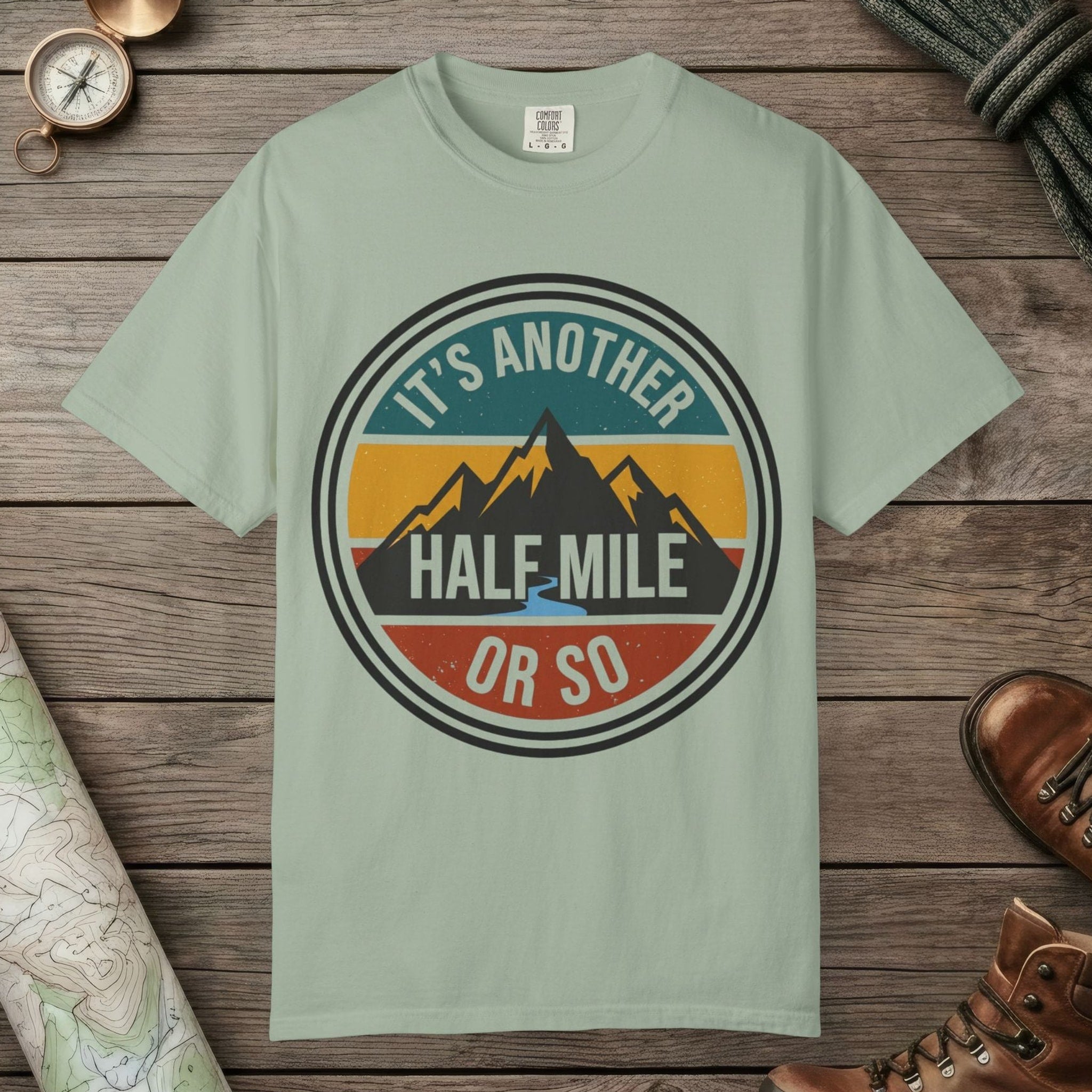 Bay color unisex graphic t-shirt with "It's Another Half Mile" design