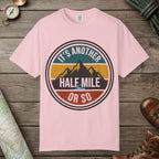 Blossom color unisex graphic t-shirt with "It's Another Half Mile" design