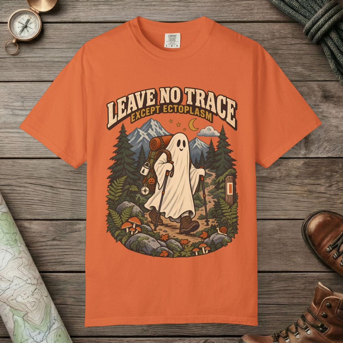 Burnt Orange color unisex graphic t-shirt with "Leave No Trace" design