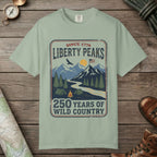 Bay color unisex graphic t-shirt with "Liberty Peaks" design