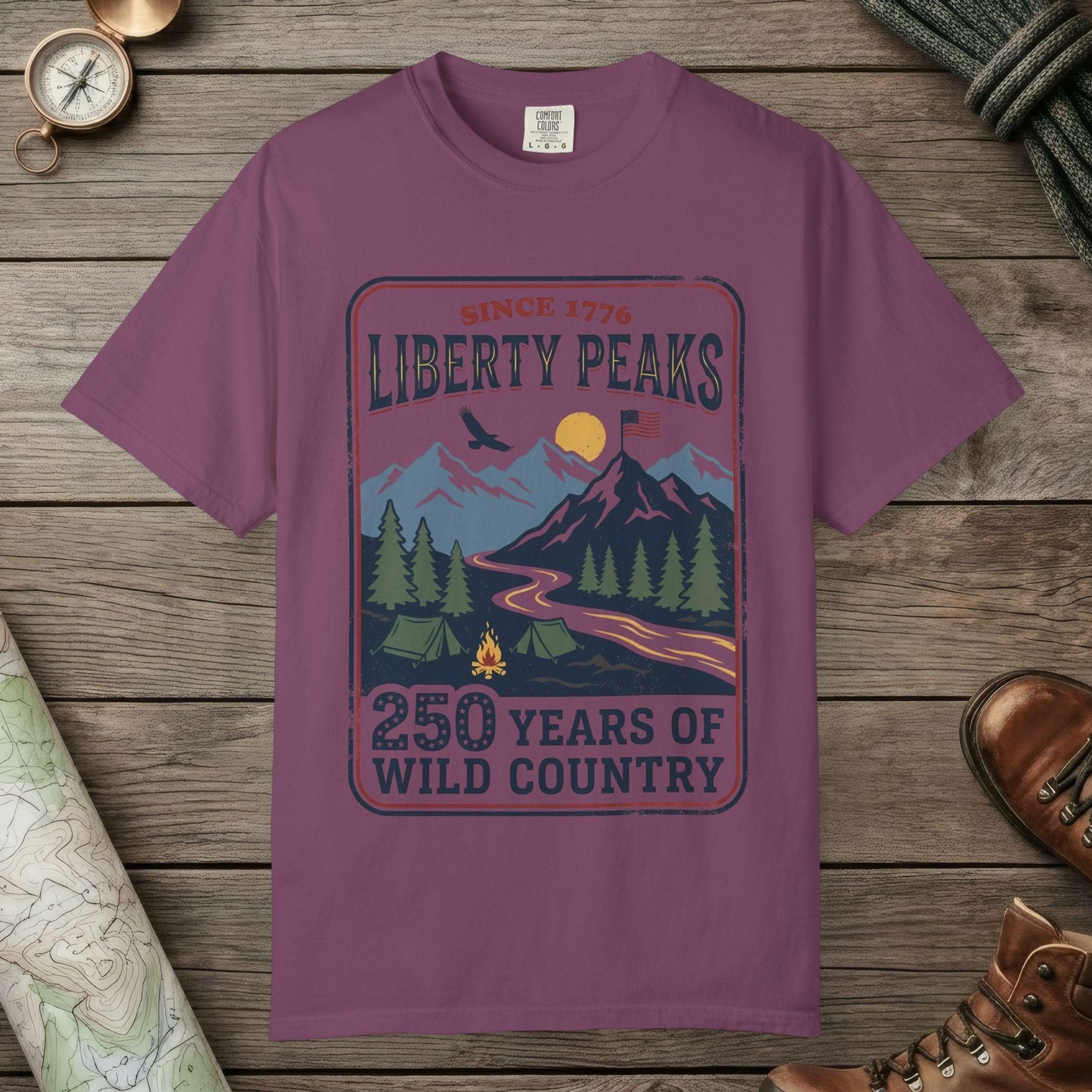 Berry color unisex graphic t-shirt with "Liberty Peaks" design