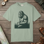 Bay color unisex graphic t-shirt with "Meditating Bigfoot" design