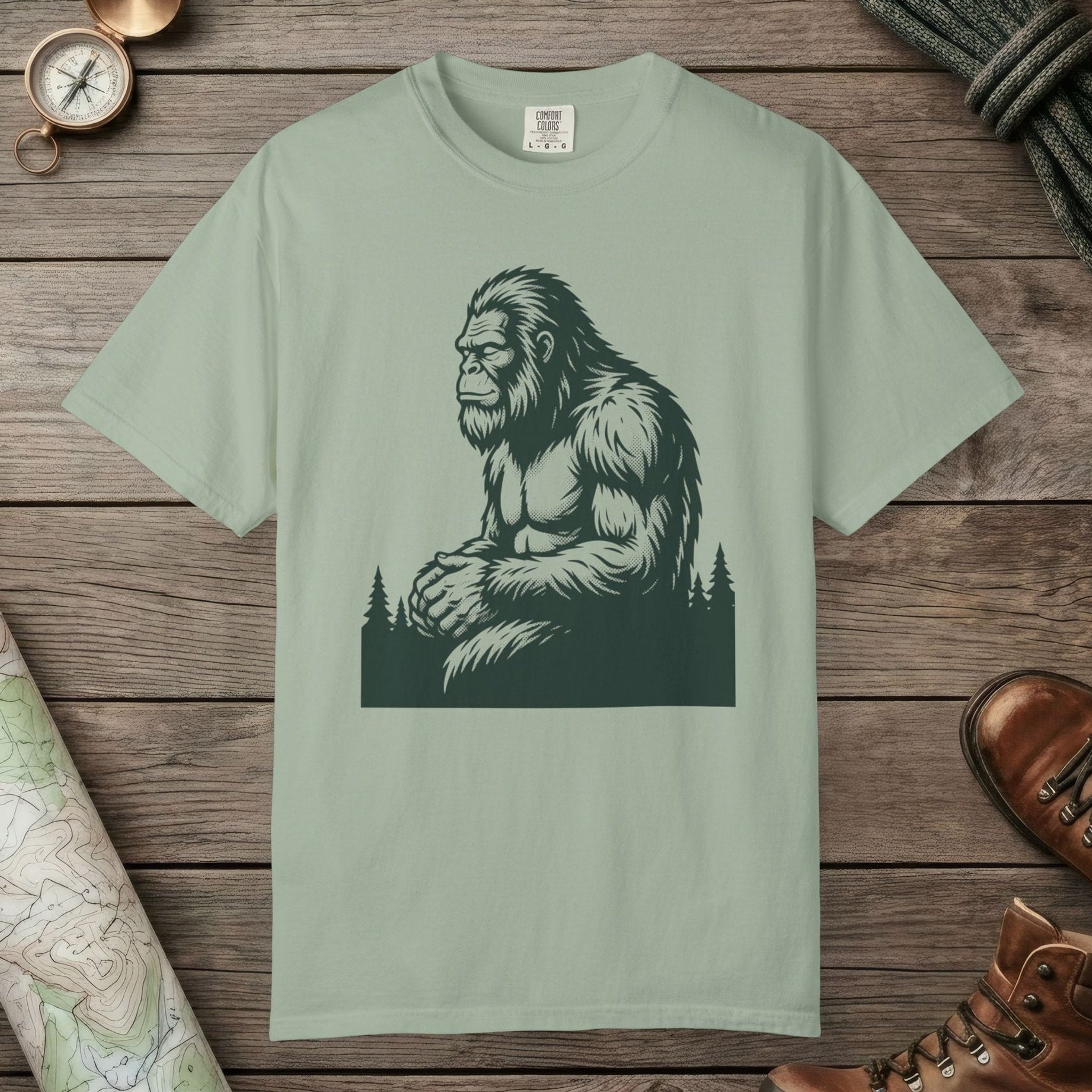 Bay color unisex graphic t-shirt with "Meditating Bigfoot" design