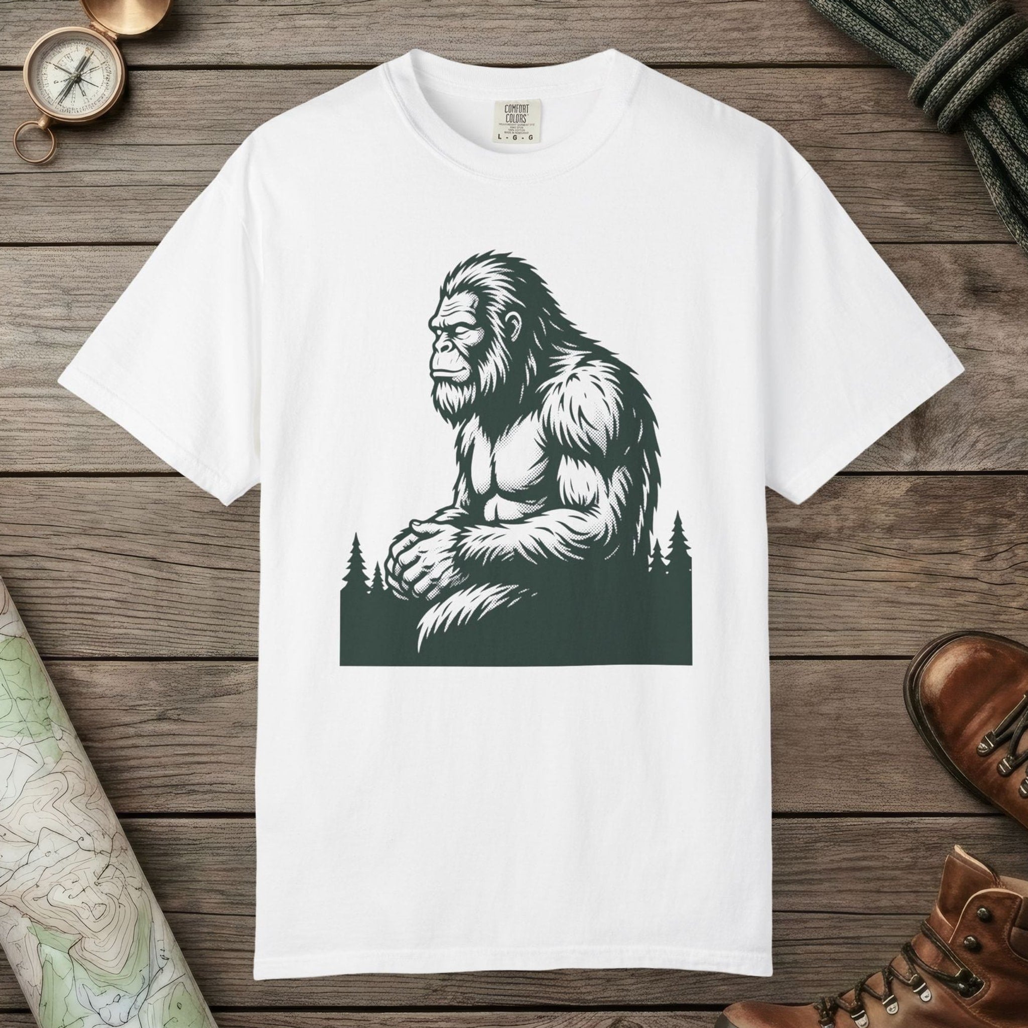 White color unisex graphic t-shirt with "Meditating Bigfoot" design