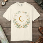 Ivory color unisex graphic t-shirt with "Moon & Wildflower Wreath" design
