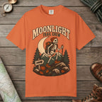 Burnt Orange color unisex graphic t-shirt with "Moonlight Trail Crew" design