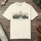 Ivory color unisex graphic t-shirt with "Mountains Are Calling" design