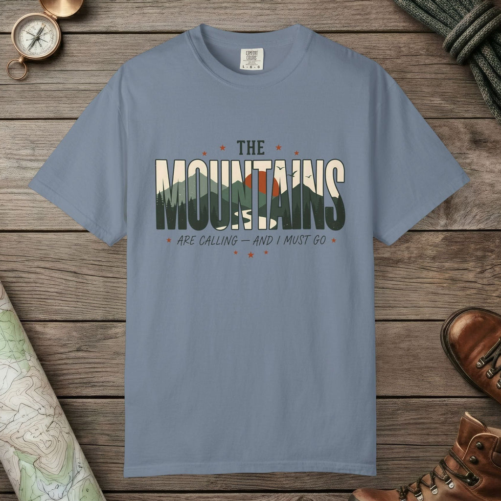 Blue Jean color unisex graphic t-shirt with "Mountains Are Calling" design