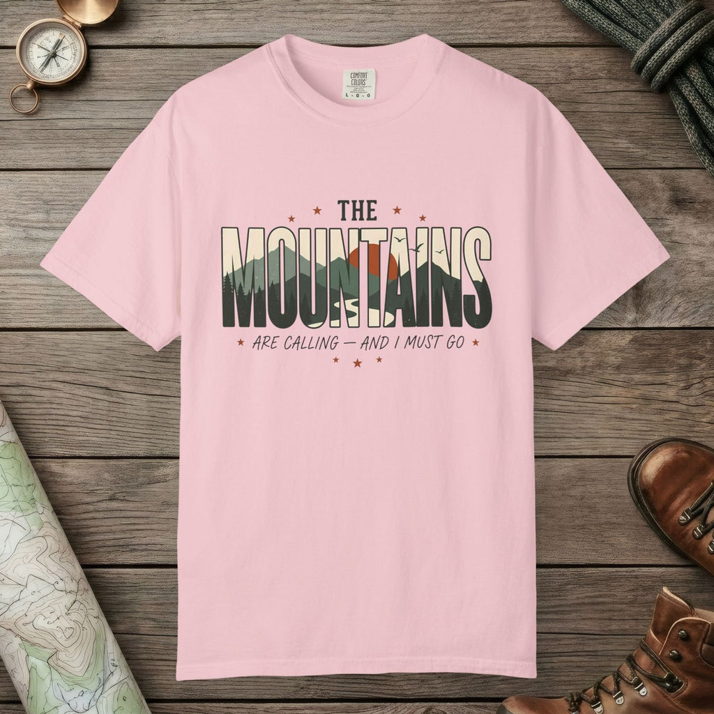 Blossom color unisex graphic t-shirt with "Mountains Are Calling" design