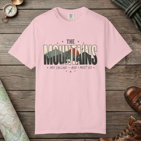 Blossom color unisex graphic t-shirt with "Mountains Are Calling" design