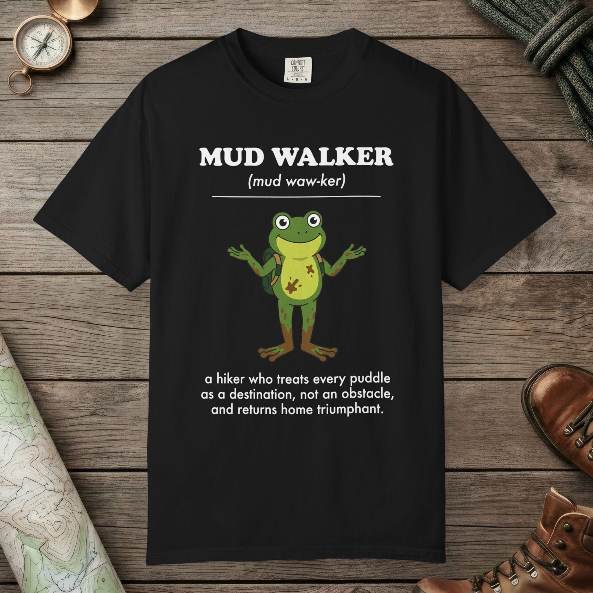 Black color unisex graphic t-shirt with "Mud Walker Definition" design