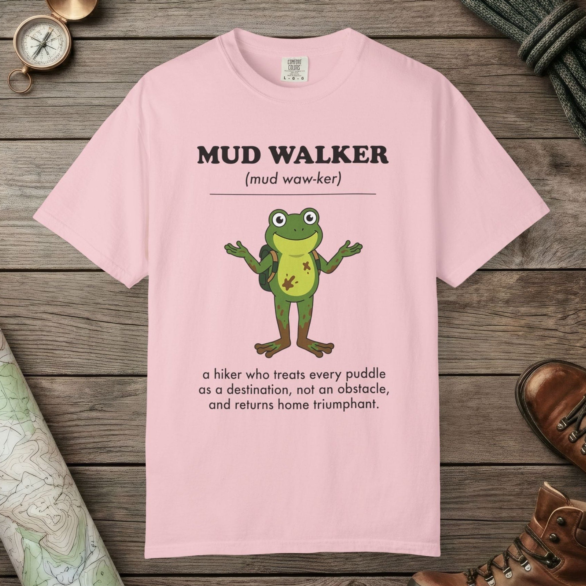 Blossom color unisex graphic t-shirt with "Mud Walker Definition" design