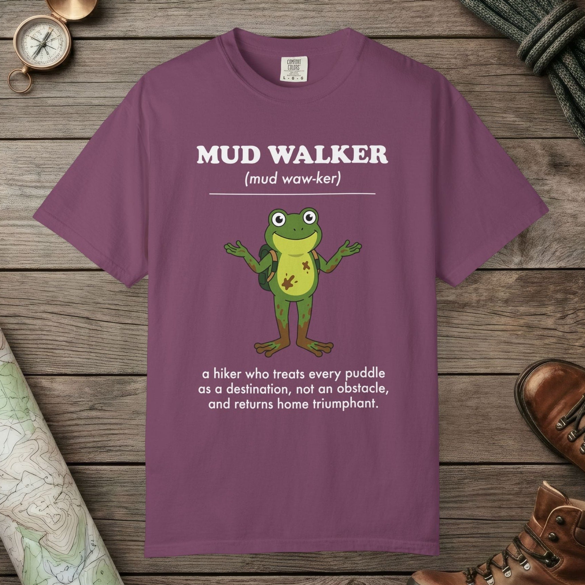 Berry color unisex graphic t-shirt with "Mud Walker Definition" design