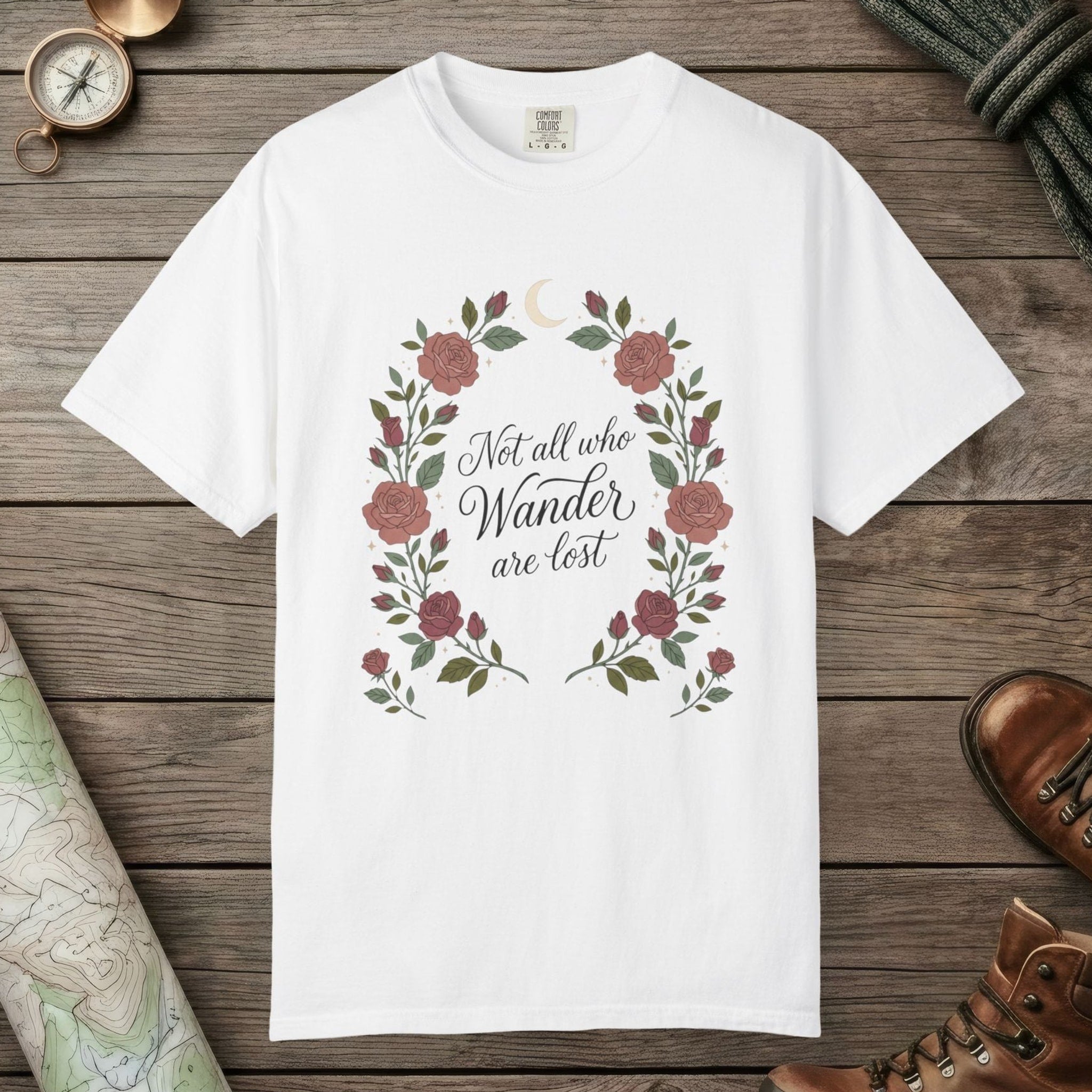 White color unisex graphic t-shirt with "Not All Who Wanders" design