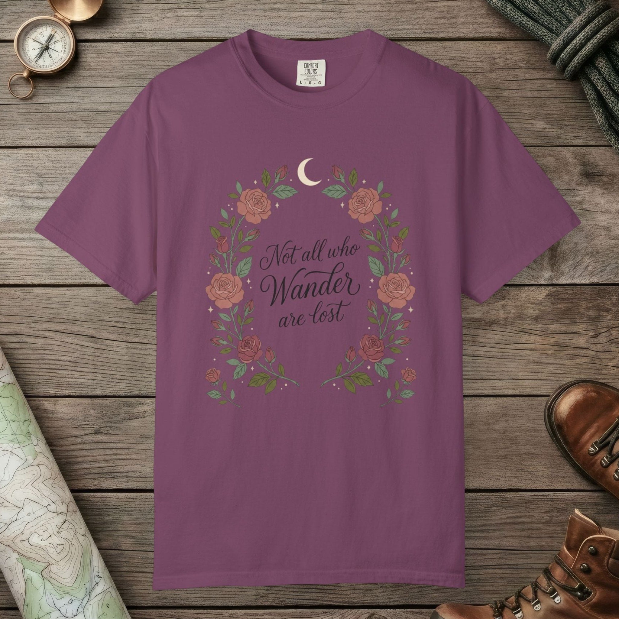 Berry color unisex graphic t-shirt with "Not All Who Wanders" design