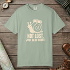 Bay color unisex graphic t-shirt with "Not Lost Snail" design