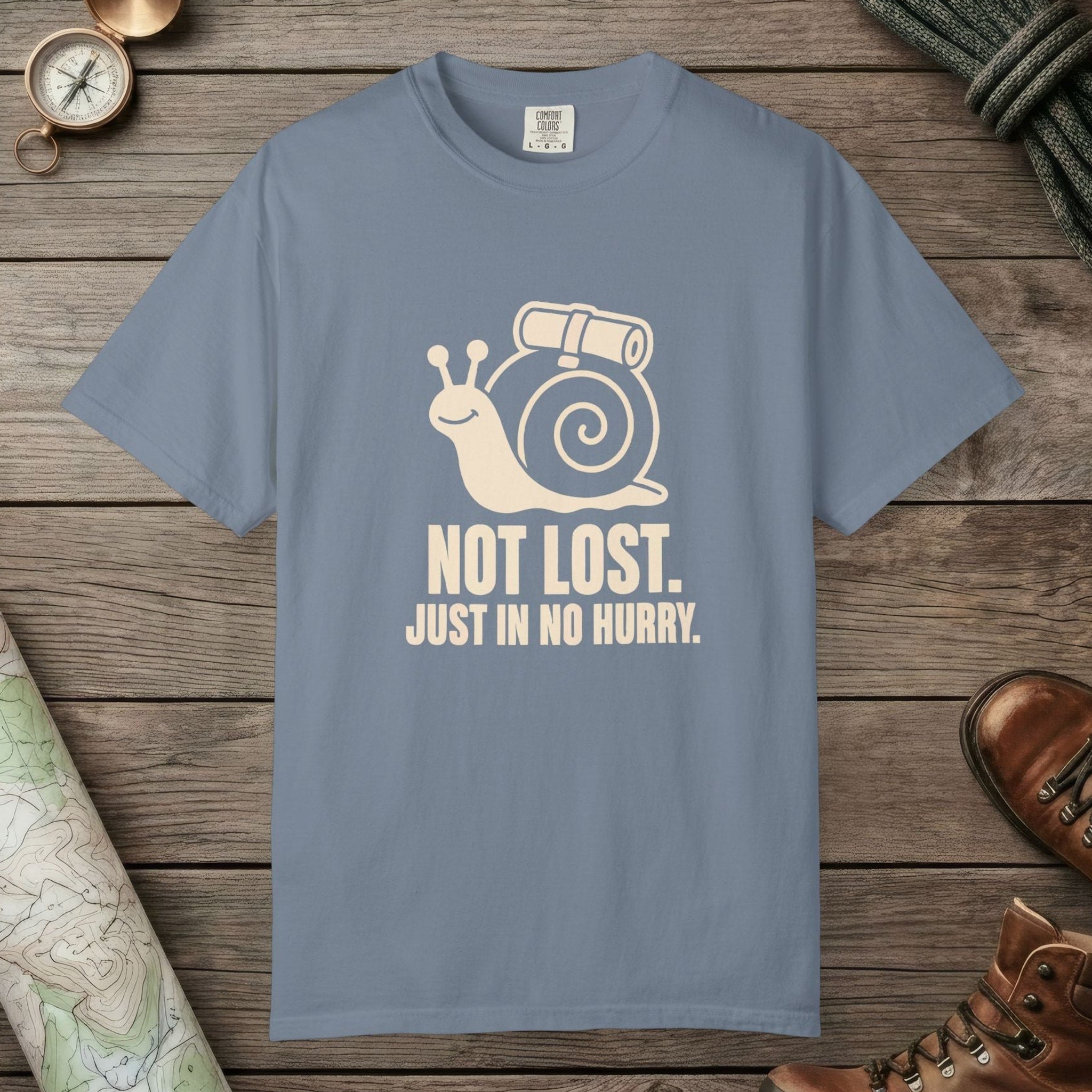 Blue Jean color unisex graphic t-shirt with "Not Lost Snail" design