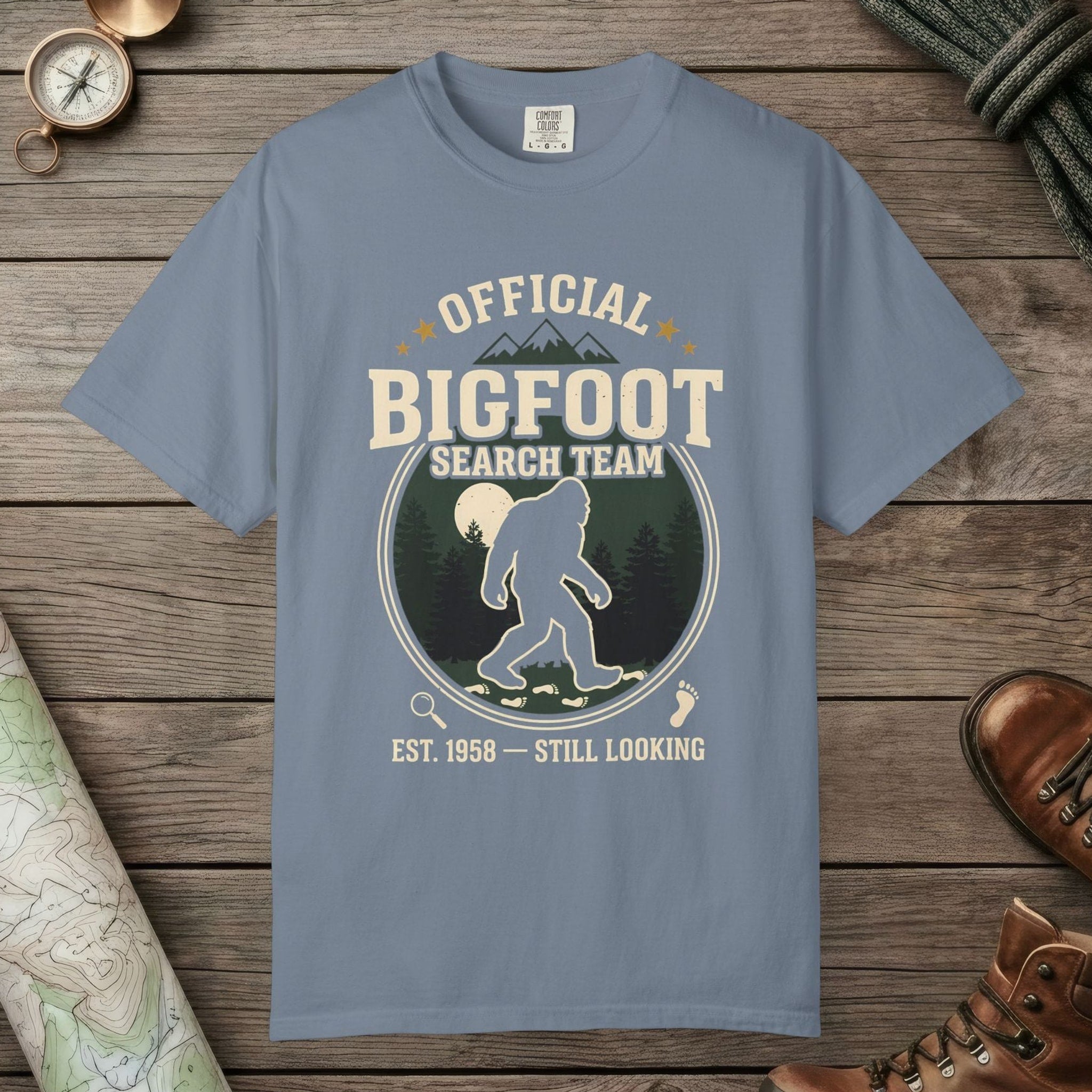 Blue Jean color unisex graphic t-shirt with "Official Bigfoot Search Team" design